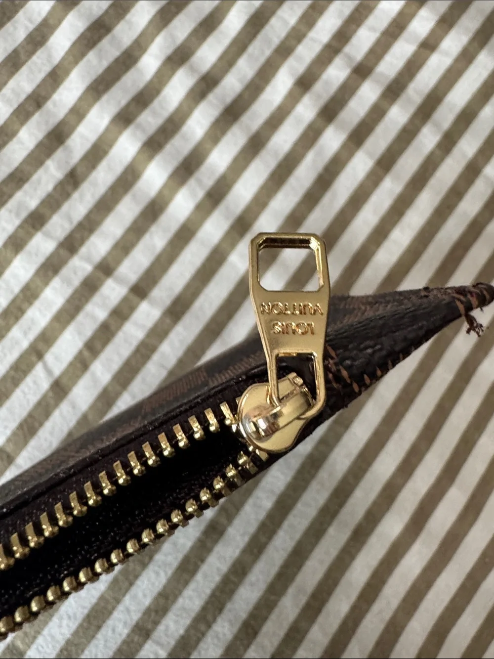Louis Vuitton **price reflects